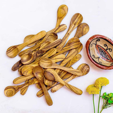 Mixing, measuring, or eating spoons sustainably handcarved out of olivewood (view from above)
