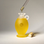 Dropper of Katari Barie prickly pear seed oil over a frosted hand-blown glass amphora with its cork