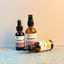 Katari First Ritual trio of Rosehip, Roseau and Hoba Oil on weathered blue wood