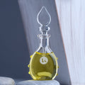 Parfum. Huiles essentielles 100 % pures et biologiques distillées à partir de plantes cultivées en Provence, France. Sans alcool, sans colorants, sans parfum artificiel.
