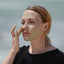 Using a green clay facial masque "Argil"