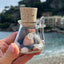 Hand-blown apothecary glass jar "Katari Beauty" in the hand