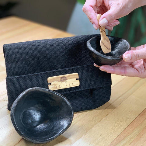 Two clay mixing bowls, linen makeup bag and mixing spatula