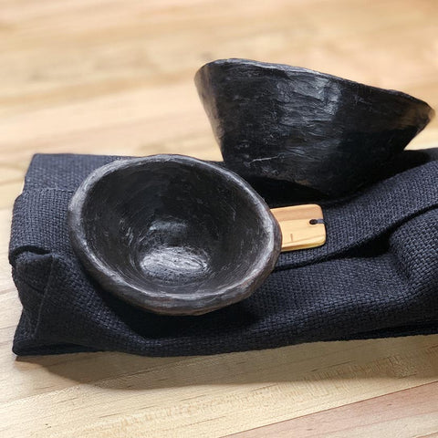 Two clay mixing bowls and linen makeup bag